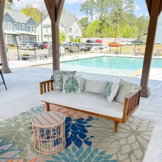 lounging seating under a pool side cabana